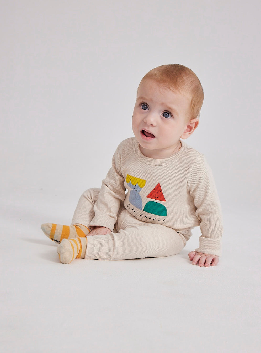 Bébé avec Legging en coton beige 