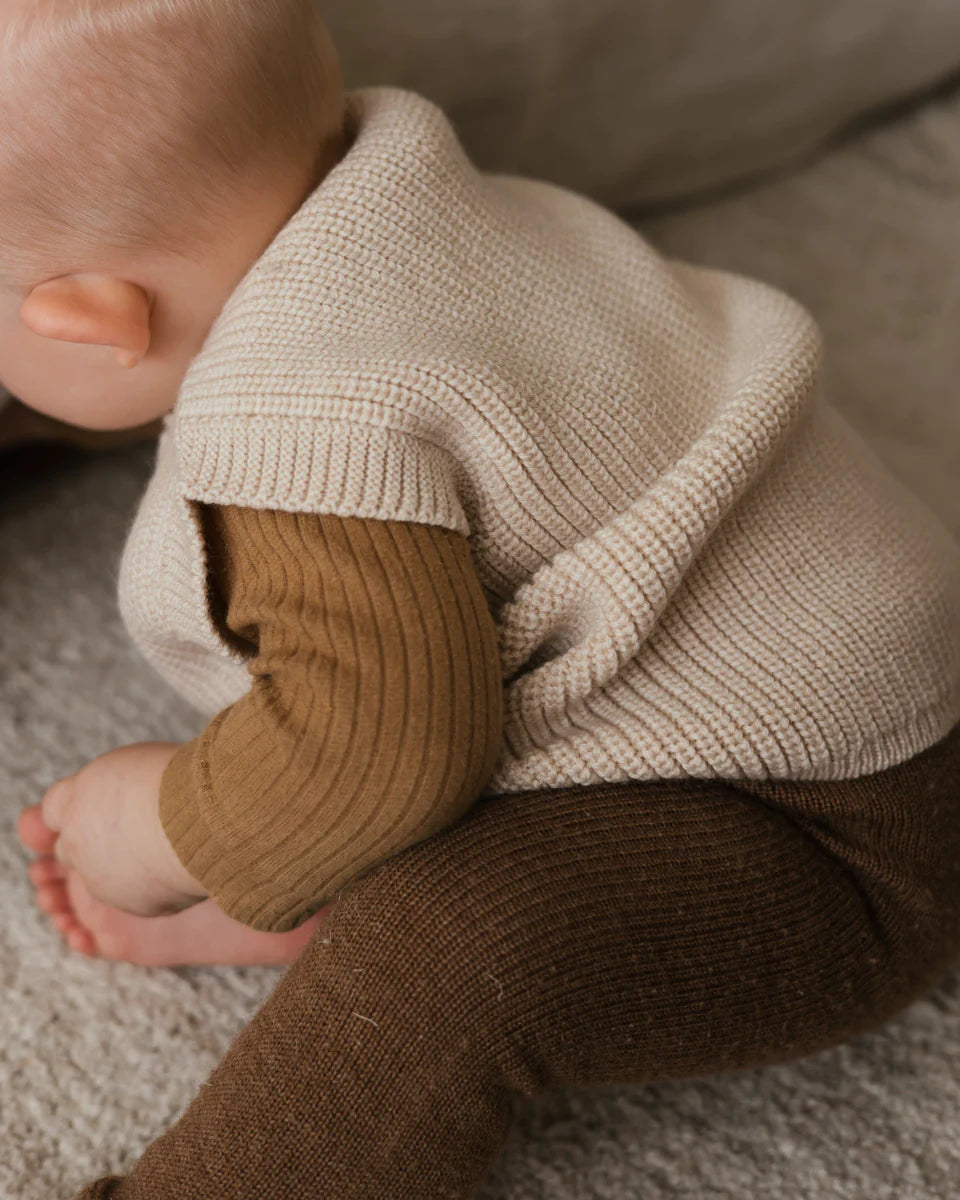 Bébé avec veste en laine mérinos crème 