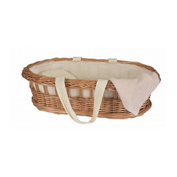 wicker basket with white handles and a knitted blanket