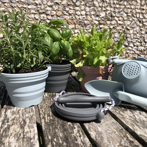 scrunch bucket seedling and trowel set duck egg blue with plants
